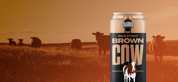 Calabogie Brown Cow Stout with countryside site field with cows in background